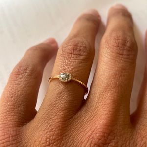 Rose gold diamond engagement ring. 14K band. Main jewel encrusted by diamonds.